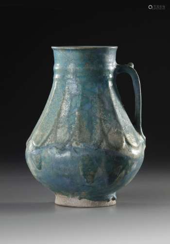 A KASHAN TURQUOISE GLAZED POTTERY JUG, PERSIA, 13TH CENTURY