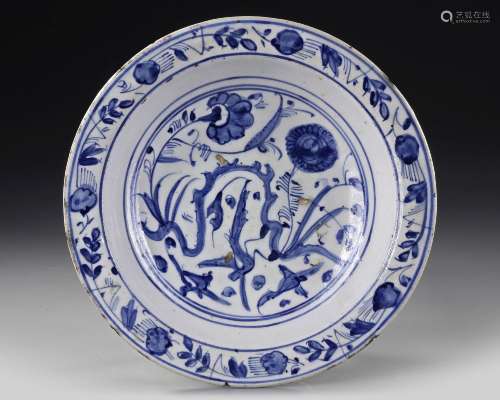 A SAFAVID BLUE AND WHITE POTTERY DISH, PERSIA, 16TH CENTURY
