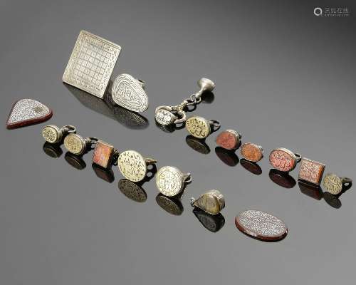 17 CARNELIAN AND SILVER SEALS WITH TEXT AND DATA, 18TH AND 1...