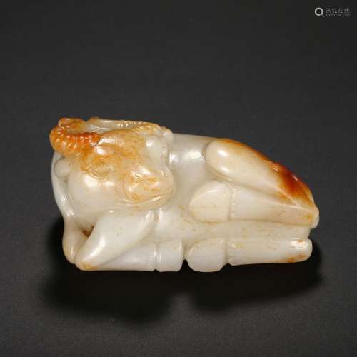 A WHITE AND RUSSET JADE BUFFALO
