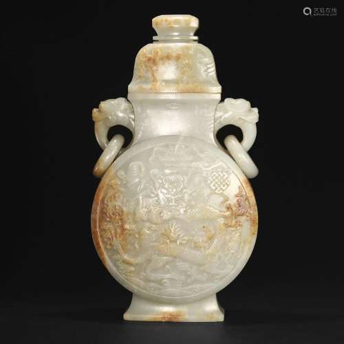 A WHITE AND RUSSET JADE 'DRAGON' VASE WITH HANDLES