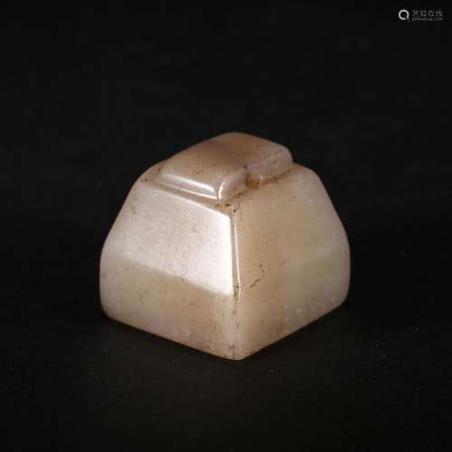 A WHITE AND GRAY JADE SEAL