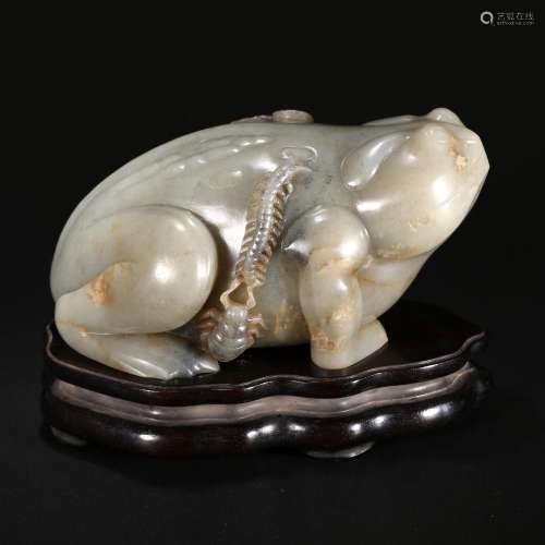 A WHITE JADE TOAD ON STAND