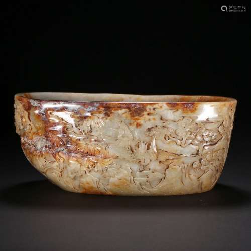 A WHITE AND BROWN JADE 'FIGURES' WATERPOT