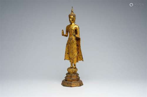 A Thai gilt bronze figure of a standing Buddha, Rattanakosin...