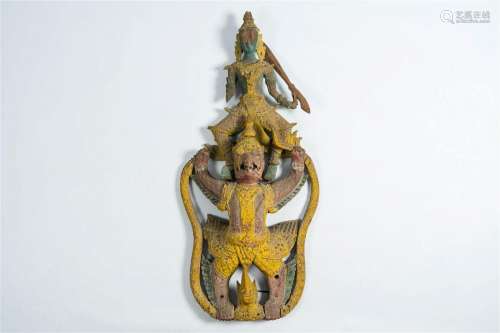 A Cambodian or Thai carved and polychrome decorated wood sta...