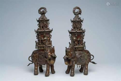 A pair of large Japanese bronze groups with elephants bearin...