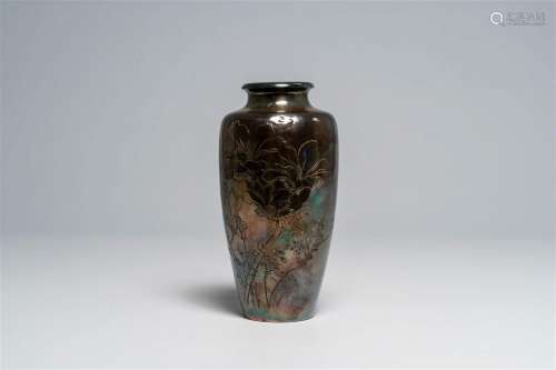 A Japanese silver vase with engraved floral design, characte...