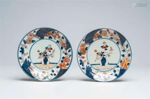 A pair of Japanese Imari dishes with a flower vase and flora...