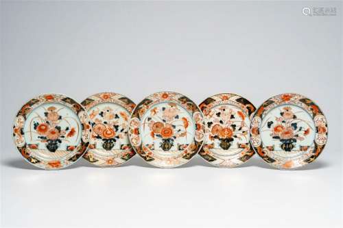 Five Japanese Imari dishes with a flower vase and floral des...