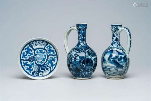 Two Japanese blue and white Arita jugs and a Chinese blue an...