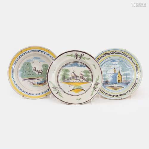 A Set of 3 Faience Dishes with Architectural Motif.