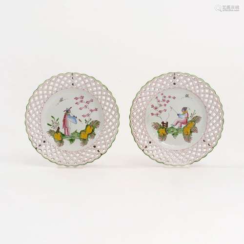 A Pair of Faience Plates with Chinoiseries.