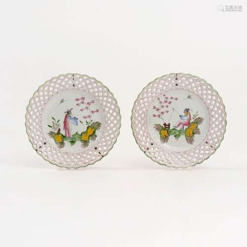A Pair of Faience Plates with Chinoiseries.