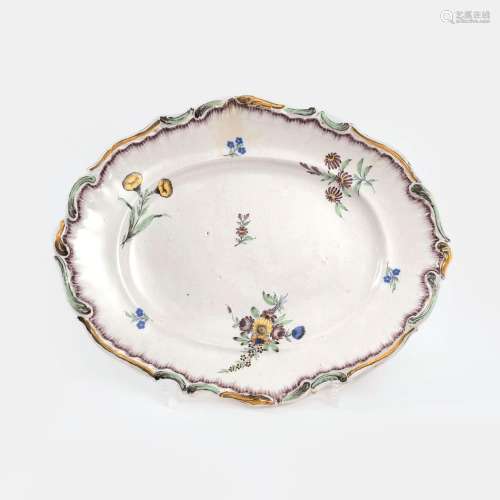 An Oval Faience Dish with Flower Painting.