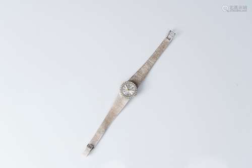 An 18 carat white gold Tissot wristwatch set with 28 diamond...