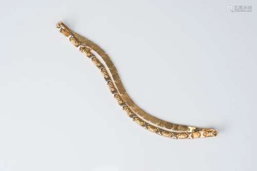An 18 carat yellow and white gold necklace, 20th C.