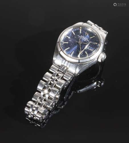 ROLEX<br />
Montre en acier, modèle "Oyster Perpetual D...