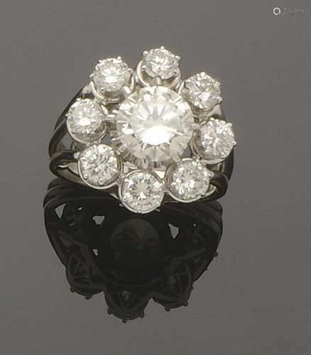 Bague "marguerite" en or gris 18K (750°/°°) et pla...