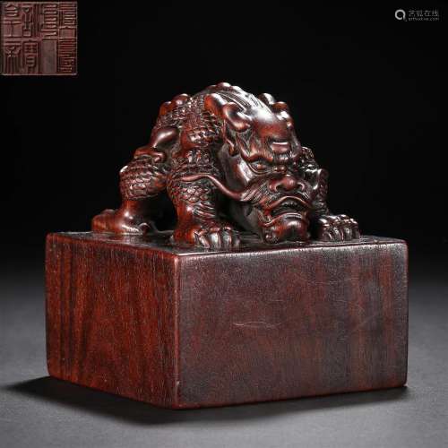 A Chinese Carved Aloeswood Beast Seal