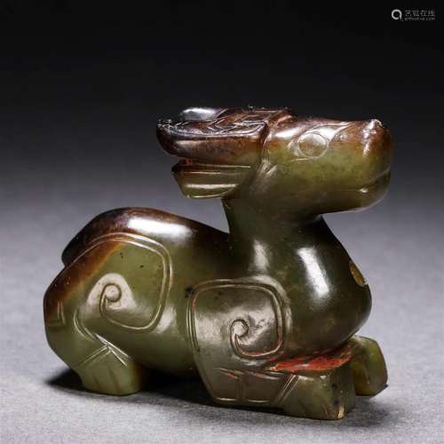 A Chinese Carved Celadon Jade Deer