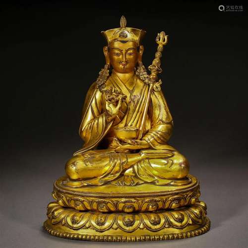 A Tibetan Bronze Gilt Figure of Padmasambhava