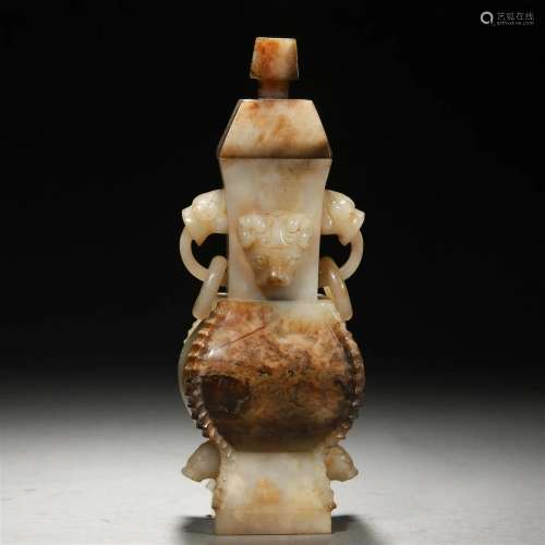 A Chinese Archaic Carved Jade Vase