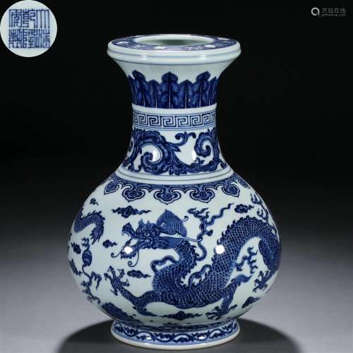 A Chinese Blue and White Dragon and Clouds Vase