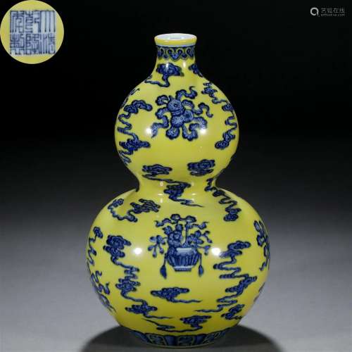 A Chinese Yellow Ground and Underglaze Blue Double Gourds Va...