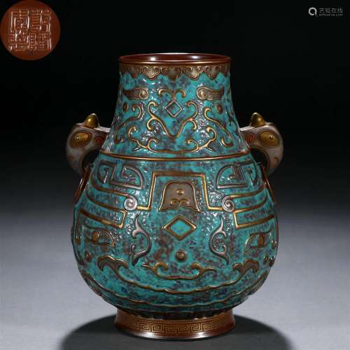 A Chinese Archaic Aubergine Glaze Zun Vase