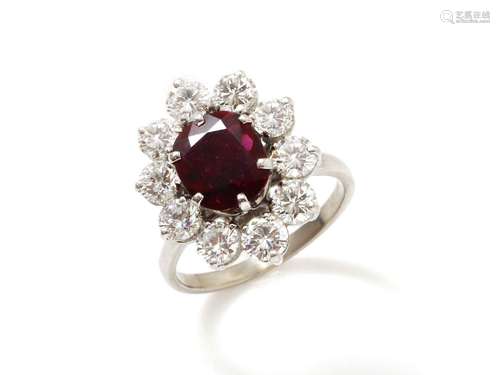 Bague en or gris 750 millièmes, ornée d'un rubis taille cous...