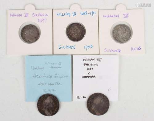 A William III sixpence 1700, two other sixpences, 1696 and 1...