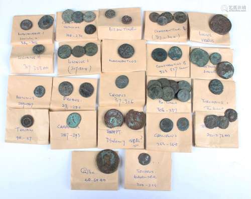 A group of Roman bronze and silver coinage, including a sest...