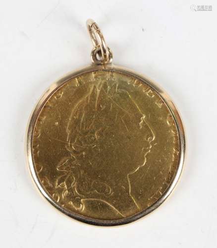 A George III guinea 1794 within a later gold cushion pendant...