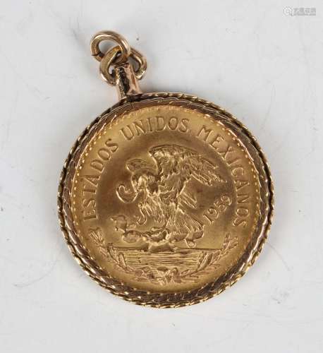 A Mexico twenty pesos 1959 within a 14ct gold ropewtist pend...