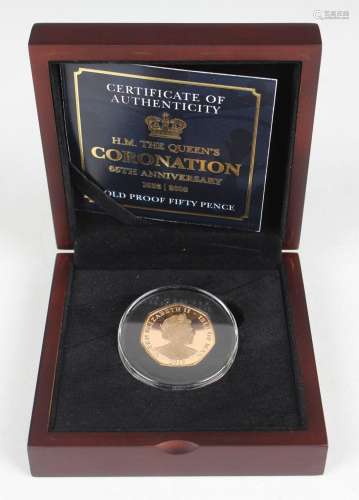 An Isle of Man gold fifty pence commemorating the 65th anniv...
