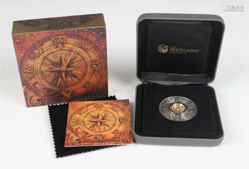 An Australia Perth Mint two-ounce silver novelty compass coi...