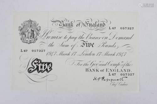 A Bank of England white five pounds note, K.O. Peppiatt Chie...