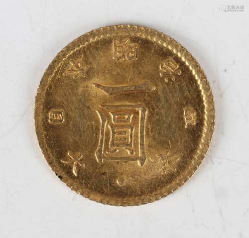 A Japanese gold one yen 1871, reverse with sunburst crest, s...