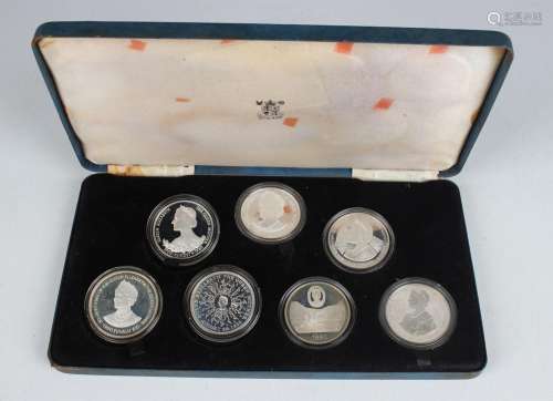 An Elizabeth II Royal Mint silver proof crown-size seven-coi...