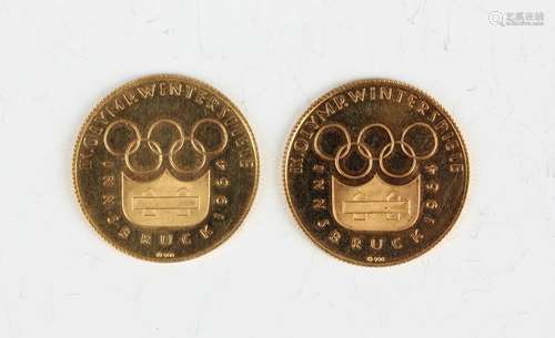 Two gold medallions commemorating the Innsbruck Winter Olymp...