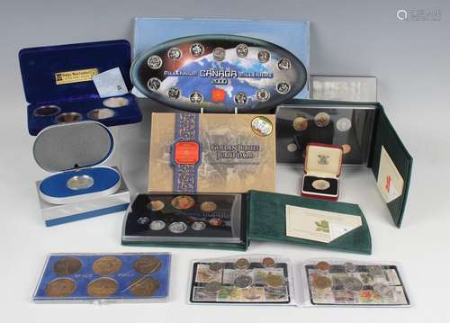 A large collection of various commemorative coins, including...