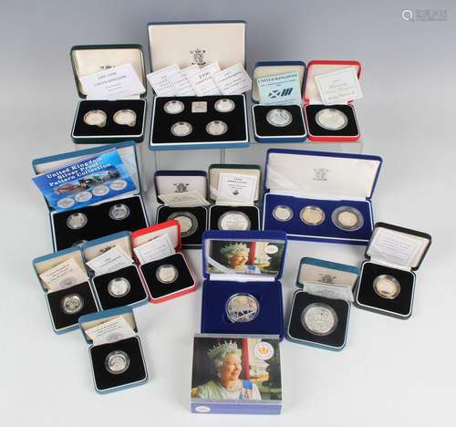 A large collection of Elizabeth II Royal Mint deluxe-format ...