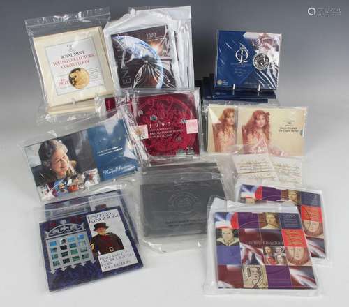 A large collection of various Royal Mint year-type sets and ...