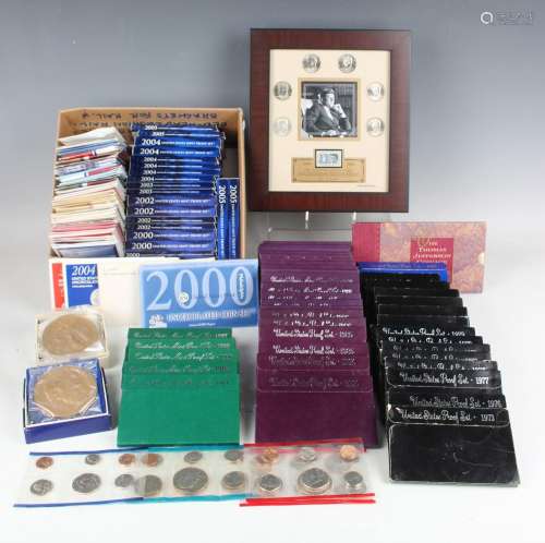 A large collection of USA commemorative coins, including a g...
