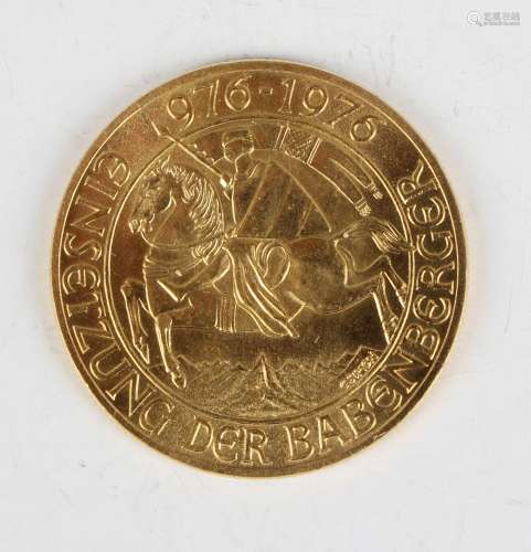 An Austria gold one thousand schillings coin 976-1976, weigh...