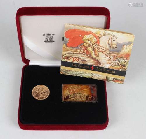 An Elizabeth II Royal Mint coin and ingot pair commemorating...