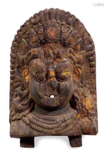 TÊTE DE BHAIRAVA.Népal, env. 17e s. H 65 cm.Bois avec restes...