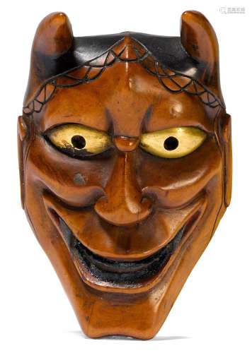 GRAND NETSUKE D'UN MASQUE HANNYA.Japon