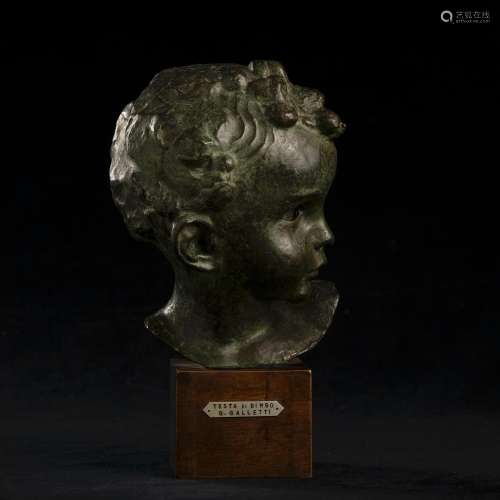 Scultura in bronzo raffigurante testa di bambino